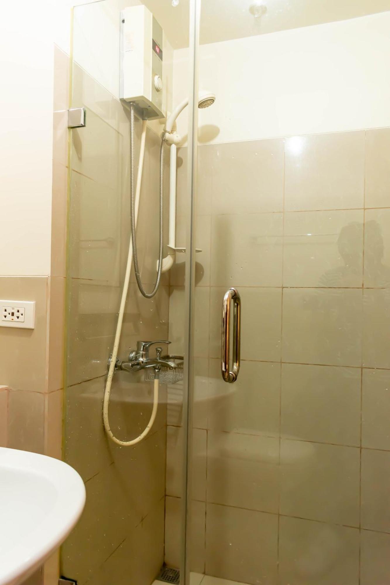 Amora Suites At The Beacon Makati Μανίλα Δωμάτιο φωτογραφία