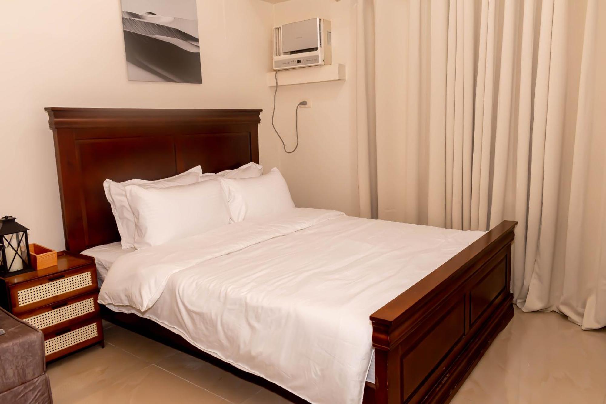 Amora Suites At The Beacon Makati Μανίλα Δωμάτιο φωτογραφία