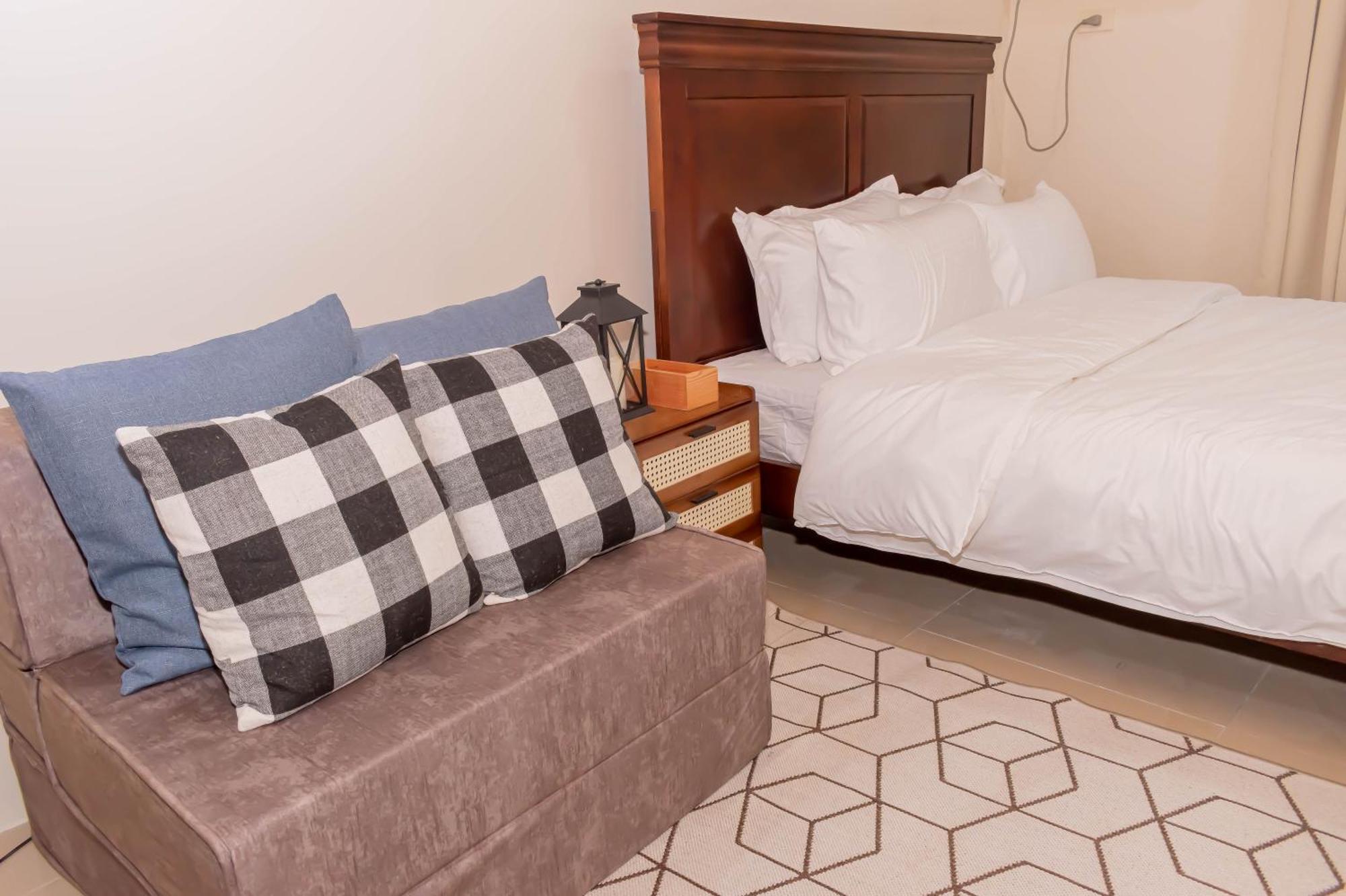 Amora Suites At The Beacon Makati Μανίλα Δωμάτιο φωτογραφία